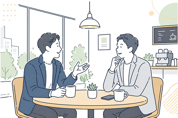 同じ立場の経営者仲間とカフェで本音を話している場面