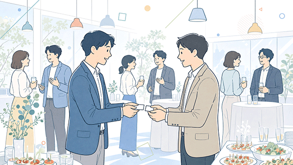 経営者交流会で名刺交換し人脈を広げる様子
